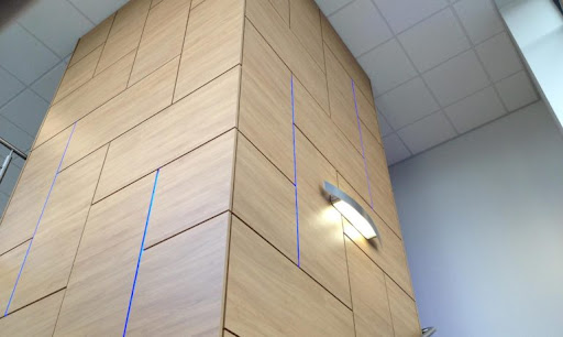 Wall with laminate panels