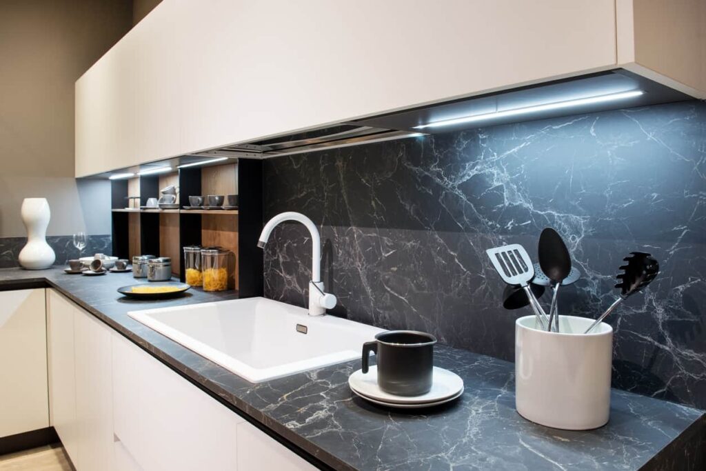 Black Marble Kitchen Countertop Color Ideas: The dark, rich color and unique veining patterns make them a luxurious choice.