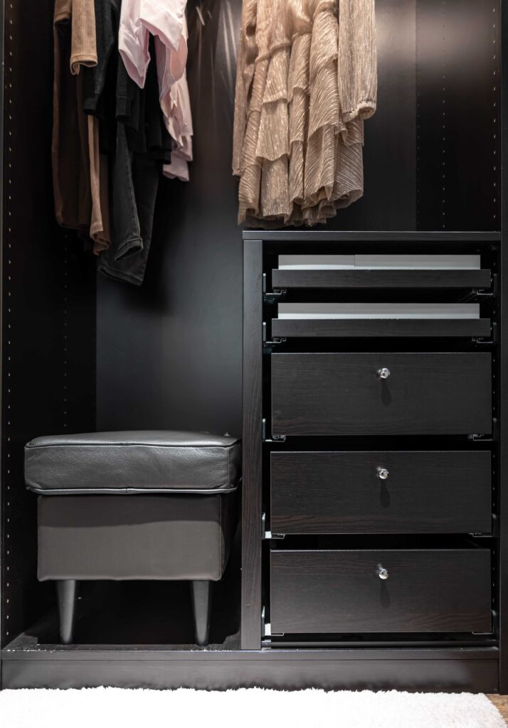 Black Matte Laminate for inside of the Wardrobe with sufficient storage space. 
