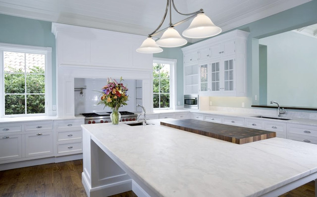 White Marble Kitchen Countertop Color Ideas: White marble create a luxurious and sophisticated atmosphere in the kitchen.