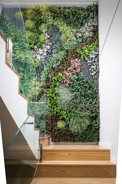 Vertical Garden Staircase Wall Design with glass railing
