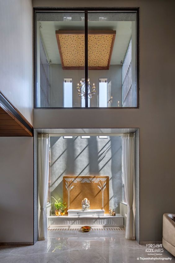Graceful Grandeur: Marble Pooja Room Design for High Ceiling Spaces