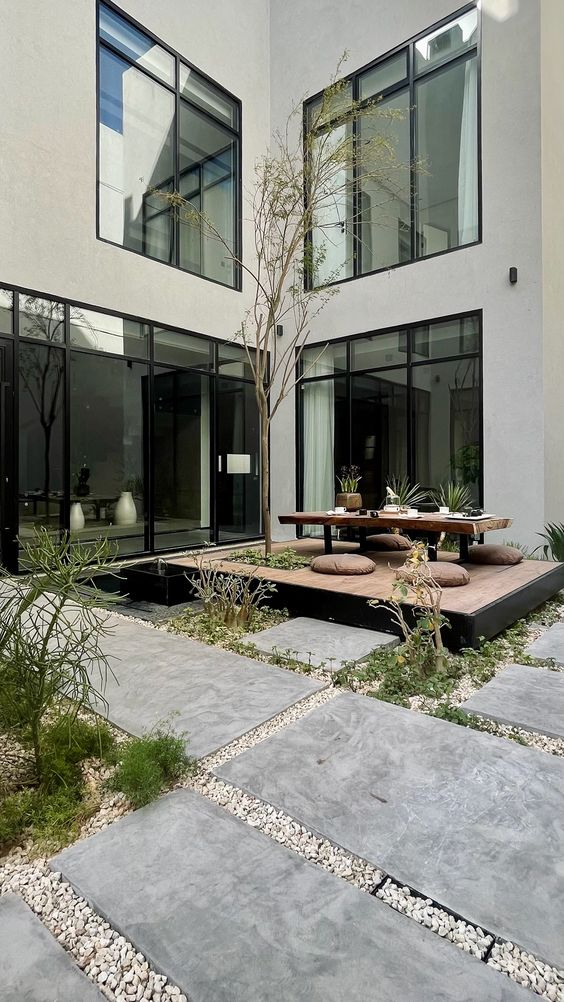 Courtyard House Design Blends with Backyard Beauty